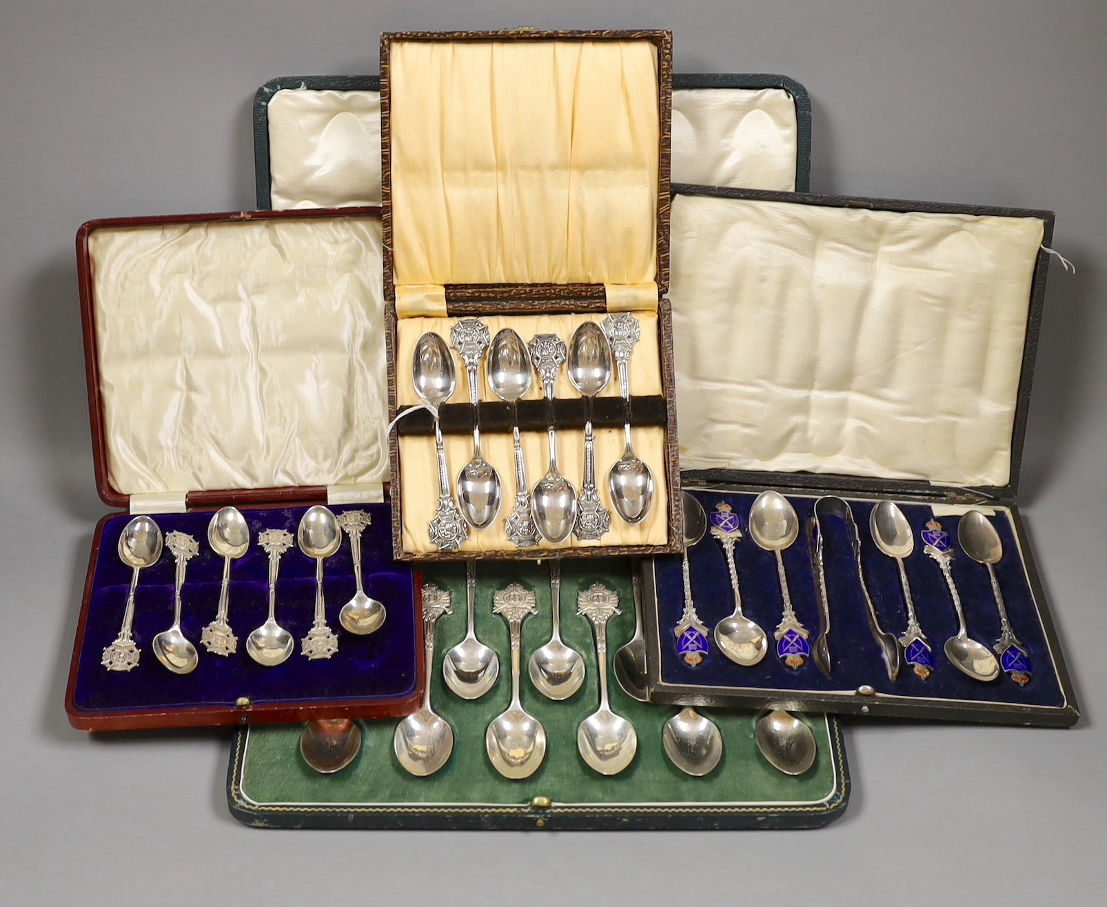 Rifle trophies: a cased set of twelve spoons, two cased sets of silver spoons and a cased set of six plated spoons
